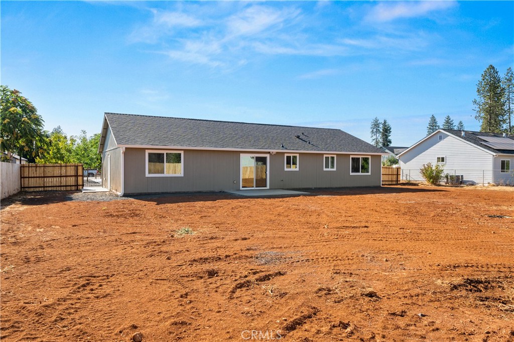 5956 Kibler Road Paradise, CA 95969 - Photo 30 of 36 a house view with wooden fence and trees in the background