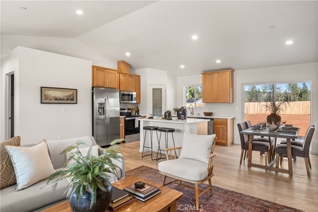 5956 Kibler Road Paradise, CA 95969 - Photo 7 of 36 a living room with furniture kitchen view and a large window