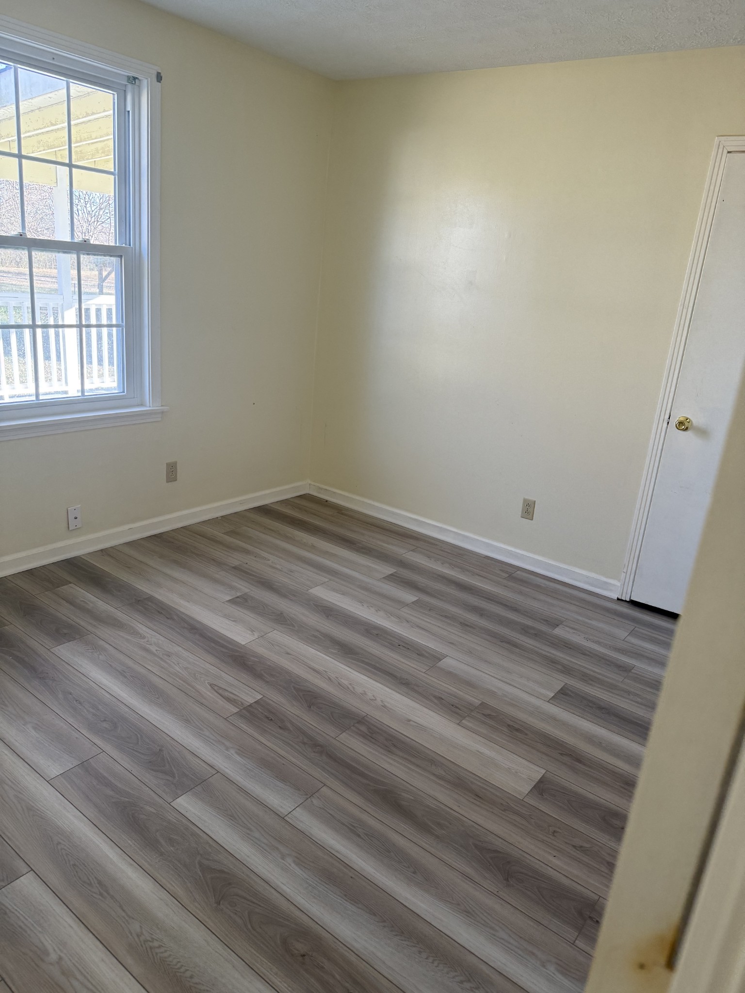 6489 Old Highway 431 South Springfield, TN 37172 - Photo 13 of 21 an empty room with wooden floor and windows