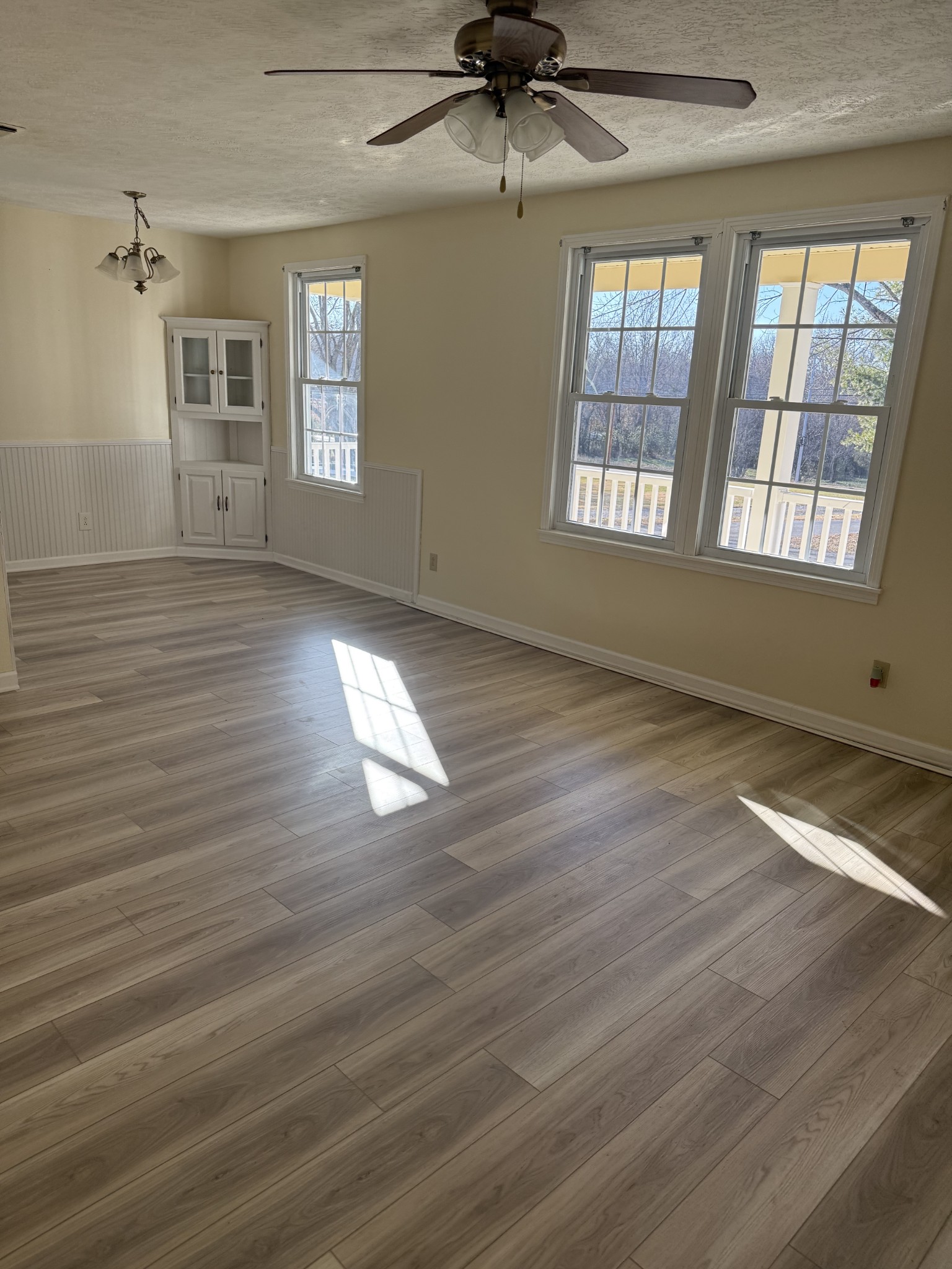 6489 Old Highway 431 South Springfield, TN 37172 - Photo 7 of 21 a view of an empty room with wooden floor and a window