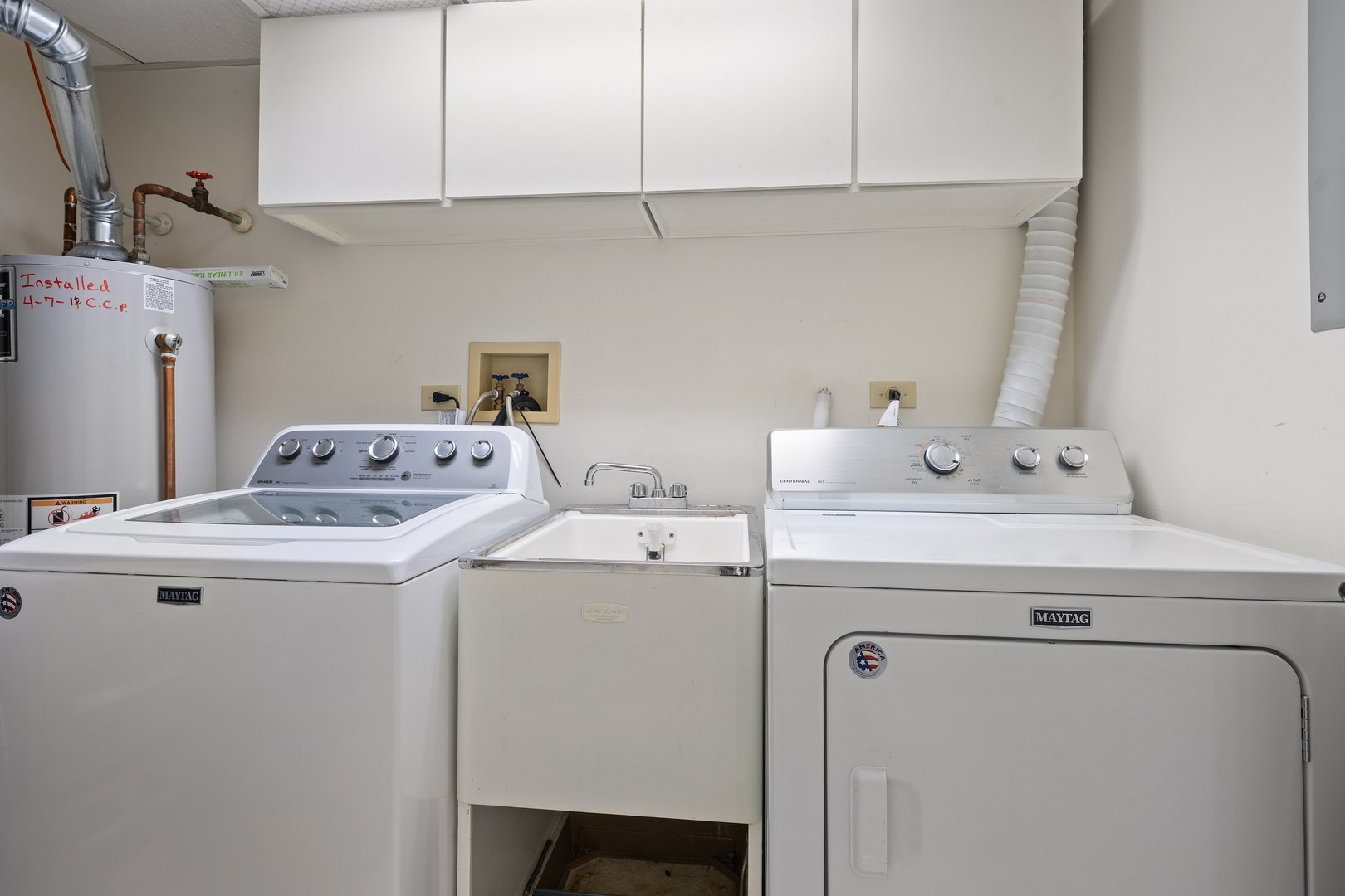 3640 186th Street, Unit 101 Lansing, IL 60438 - Photo 14 of 17 a utility room with dryer and washer