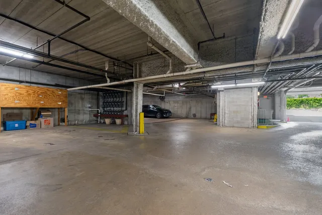 a view of empty room with wooden ceiling