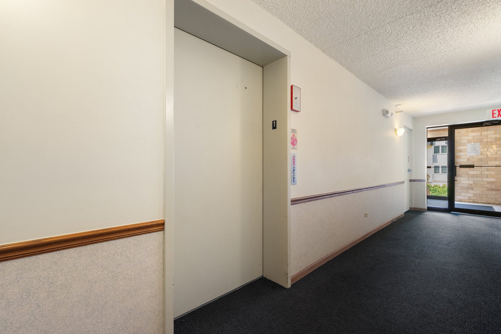 3640 186th Street, Unit 101 Lansing, IL 60438 - Photo 2 of 17 a view of a hallway with closet