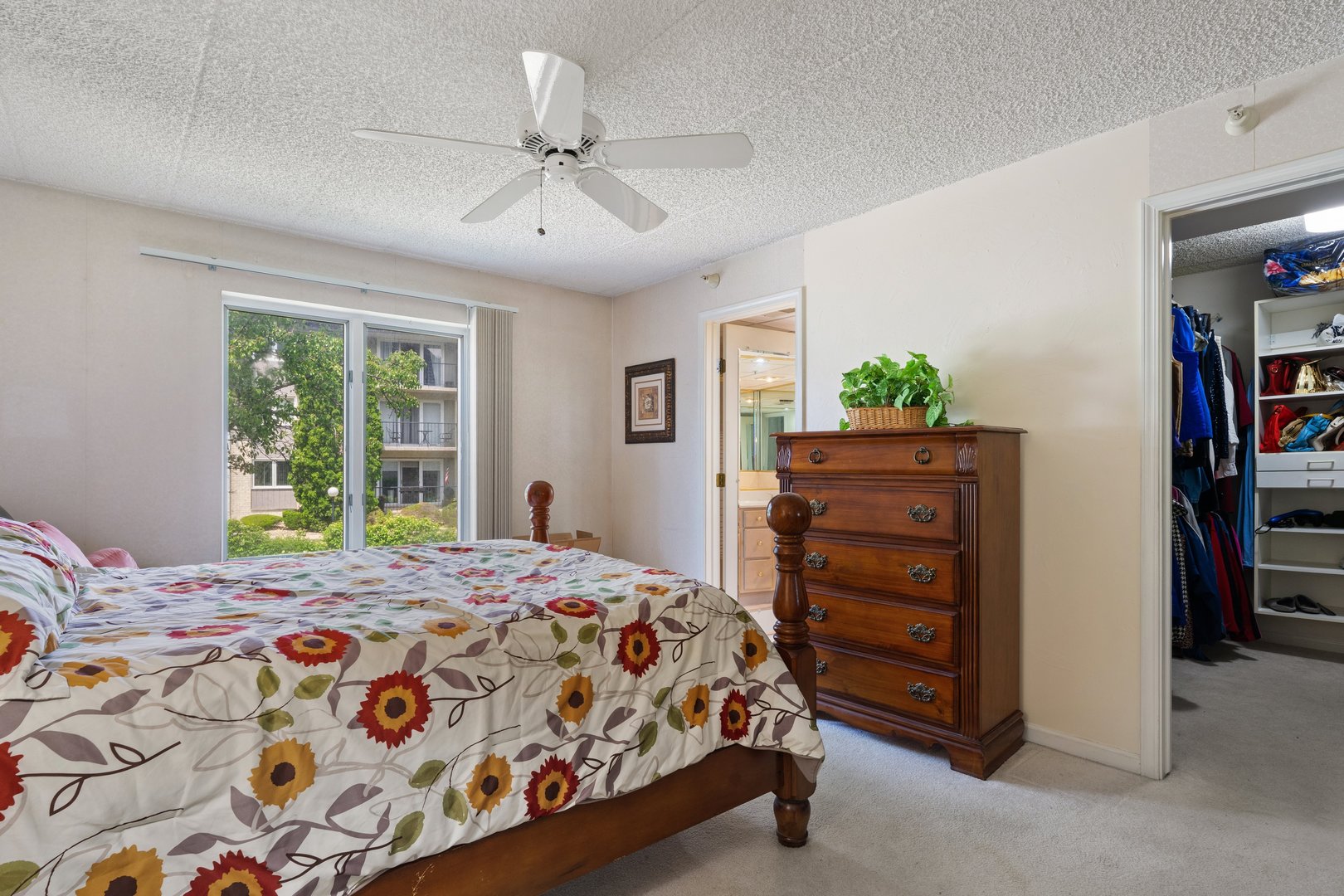 3640 186th Street, Unit 101 Lansing, IL 60438 - Photo 9 of 17 a bedroom with a bed and a window