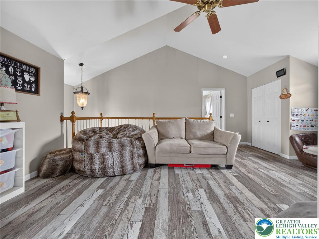 2628 Levans Road Coplay, PA 18037 - Photo 29 of 54 Lofty ceilings complement durable plank flooring in this flexible upstairs landing.