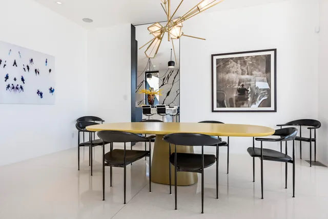 a kitchen with a sink and a stove top oven