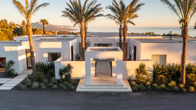 a view of a house with a ocean view