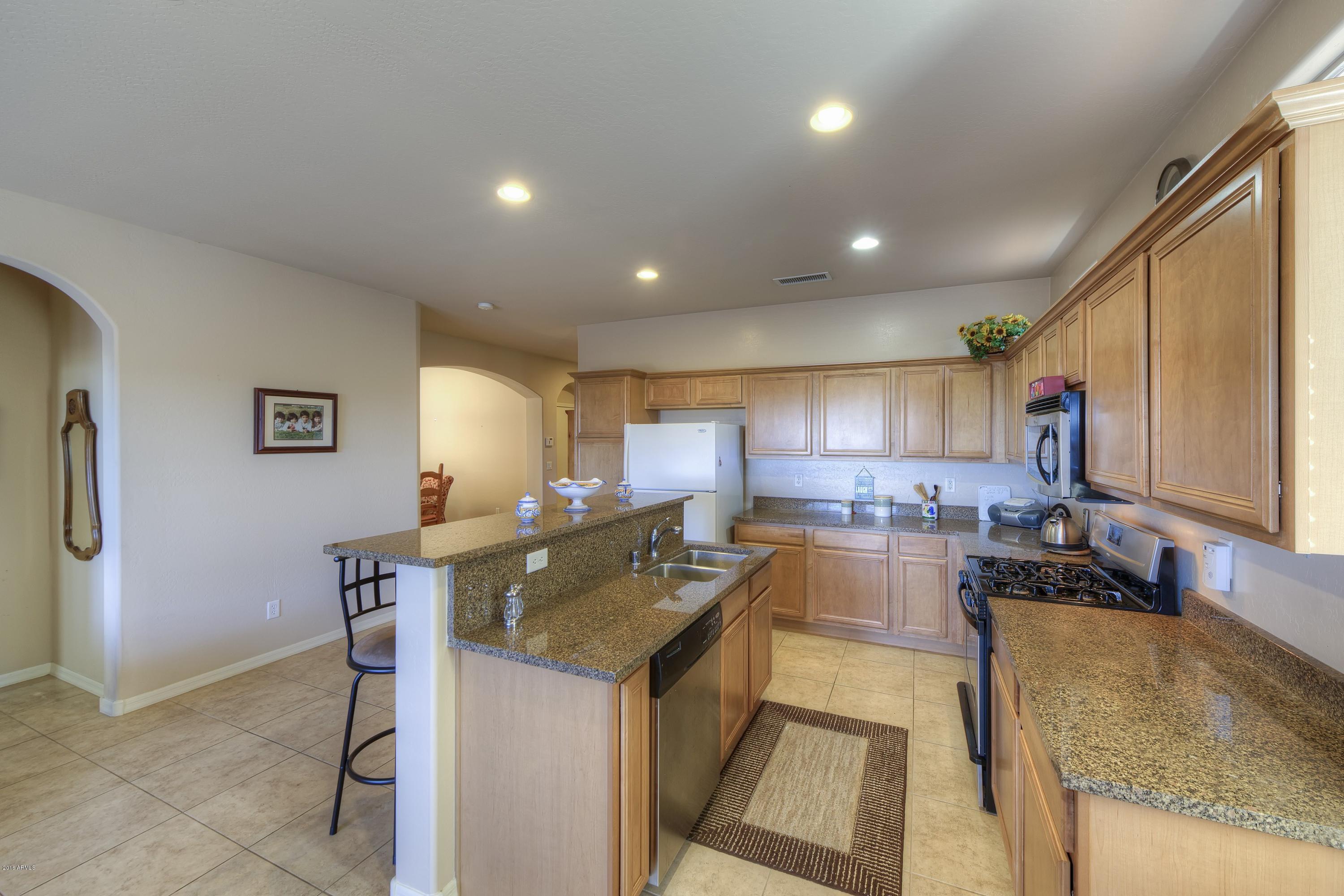 3241 West Florimond Road Phoenix, AZ 85086 - Photo 8 of 16 008_Kitchen to Dining Room