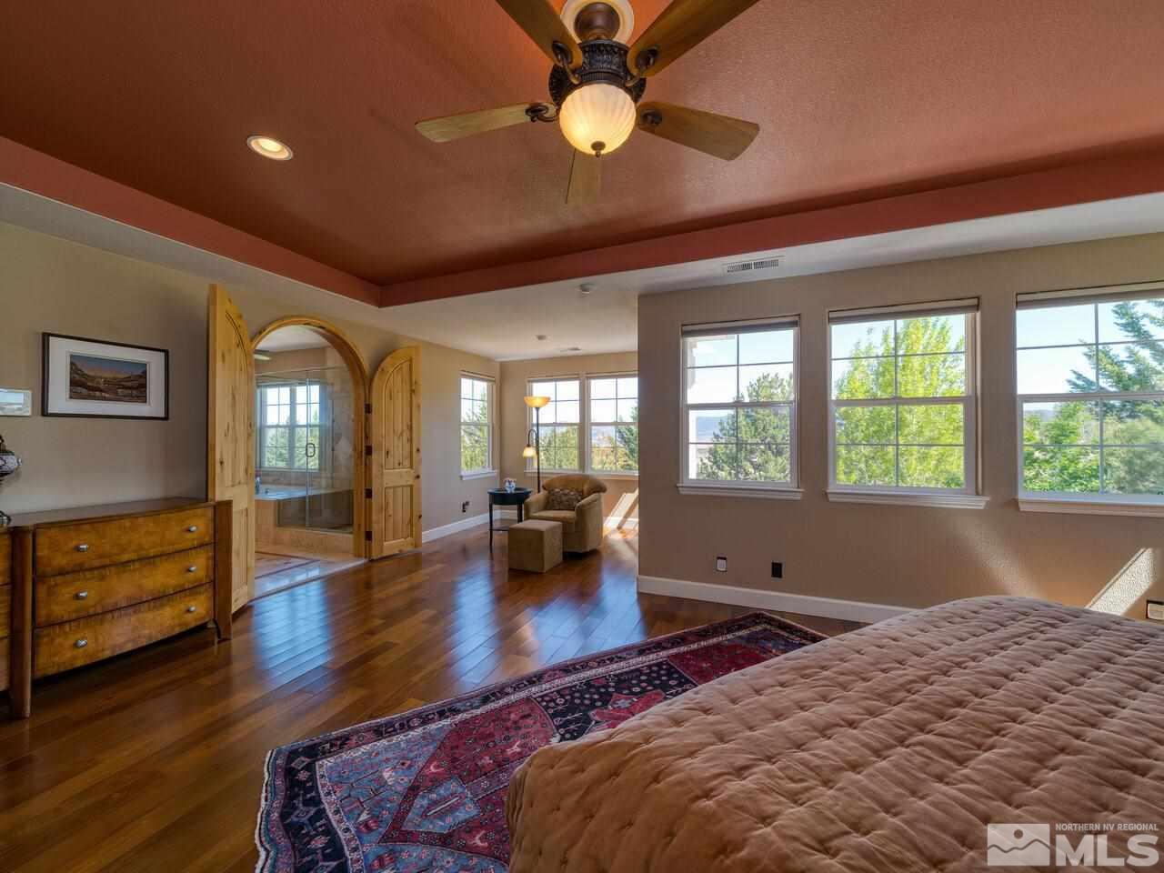 2984 Roundrock Court Reno, NV 89511 - Photo 23 of 40 a bedroom with furniture and a large window