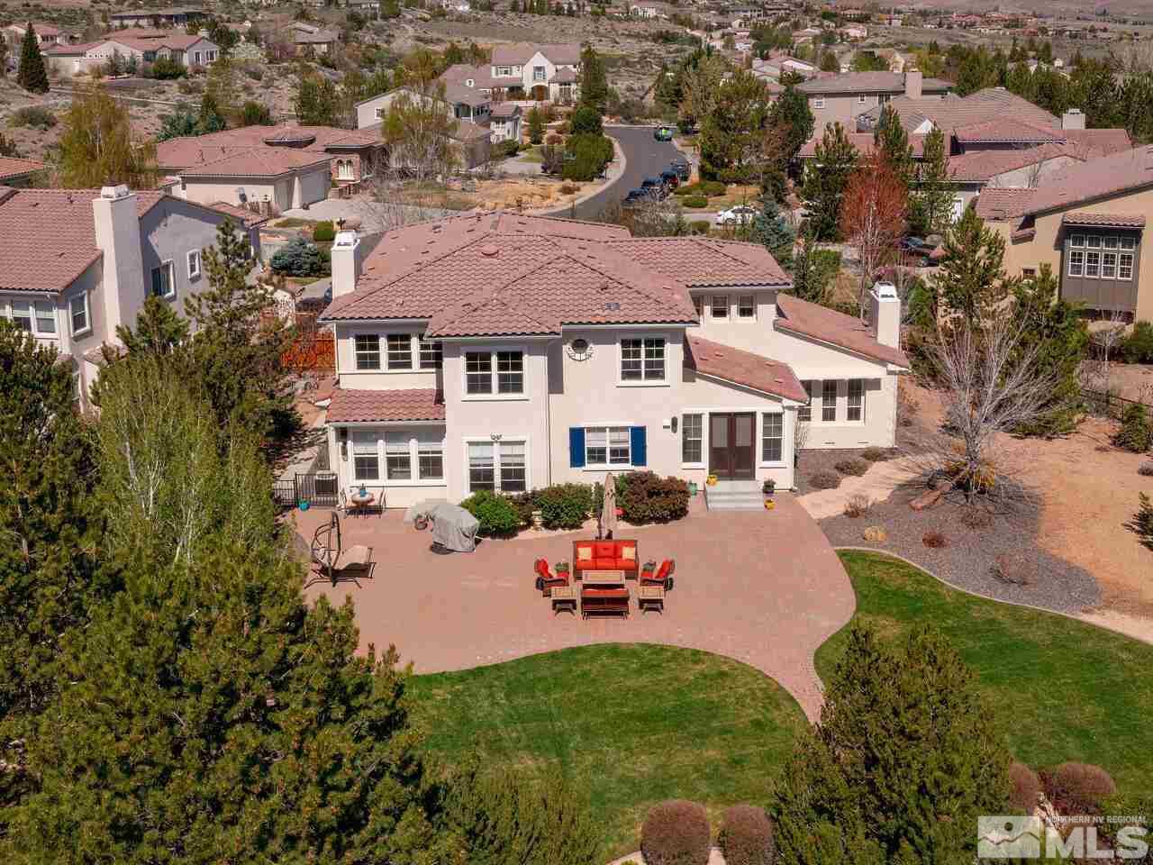 2984 Roundrock Court Reno, NV 89511 - Photo 4 of 40 an aerial view of a house with garden space and a street view