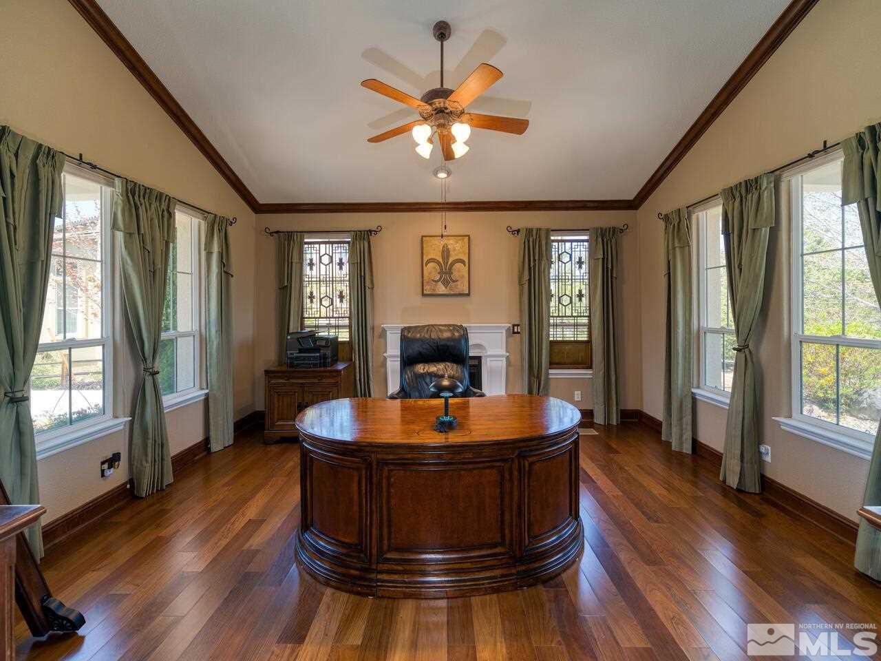 2984 Roundrock Court Reno, NV 89511 - Photo 9 of 40 a room with wooden floors table and windows