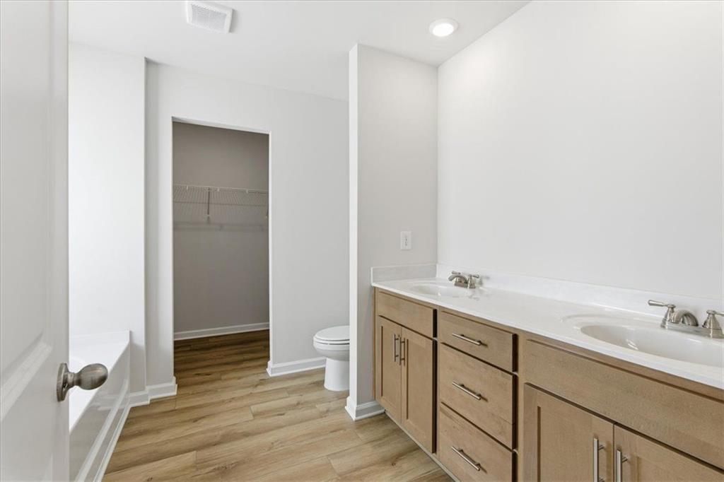 129 Bloomfield Circle Canton, GA 30114 - Photo 17 of 36 a bathroom with a sink and a toilet