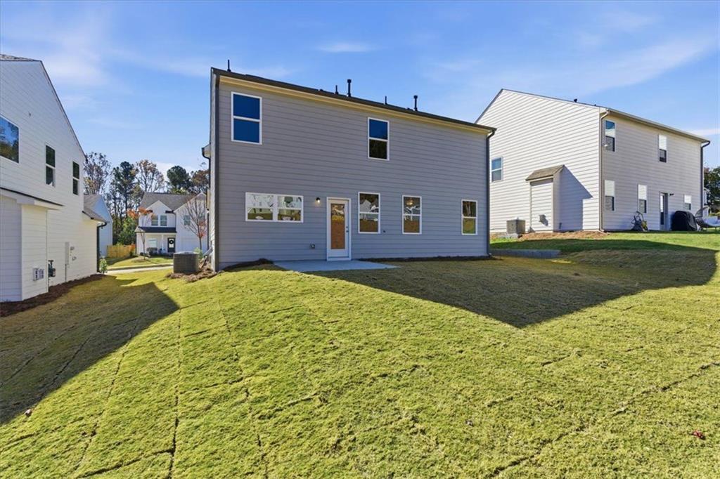 129 Bloomfield Circle Canton, GA 30114 - Photo 29 of 36 a front view of a house with a yard