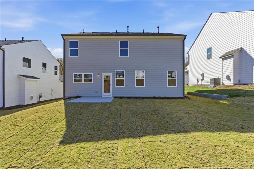 129 Bloomfield Circle Canton, GA 30114 - Photo 30 of 36 a view of a house with a yard