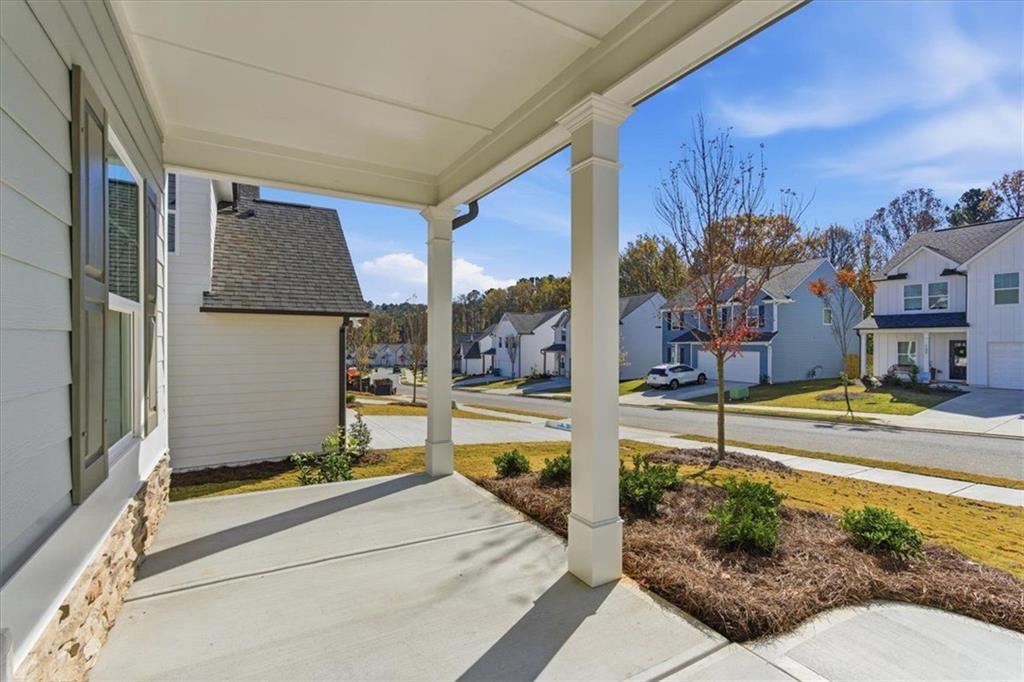 129 Bloomfield Circle Canton, GA 30114 - Photo 3 of 36 a view of swimming pool with a lounge chairs