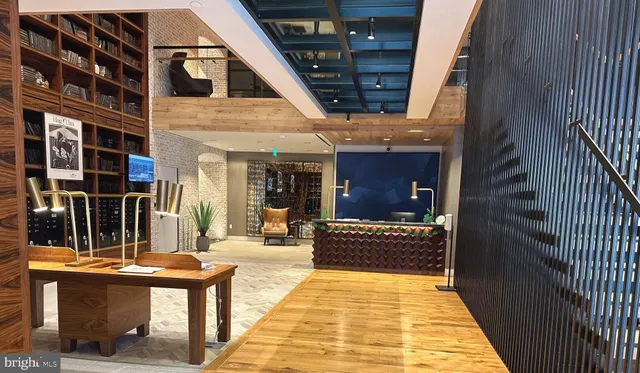 a balcony view with a seating space