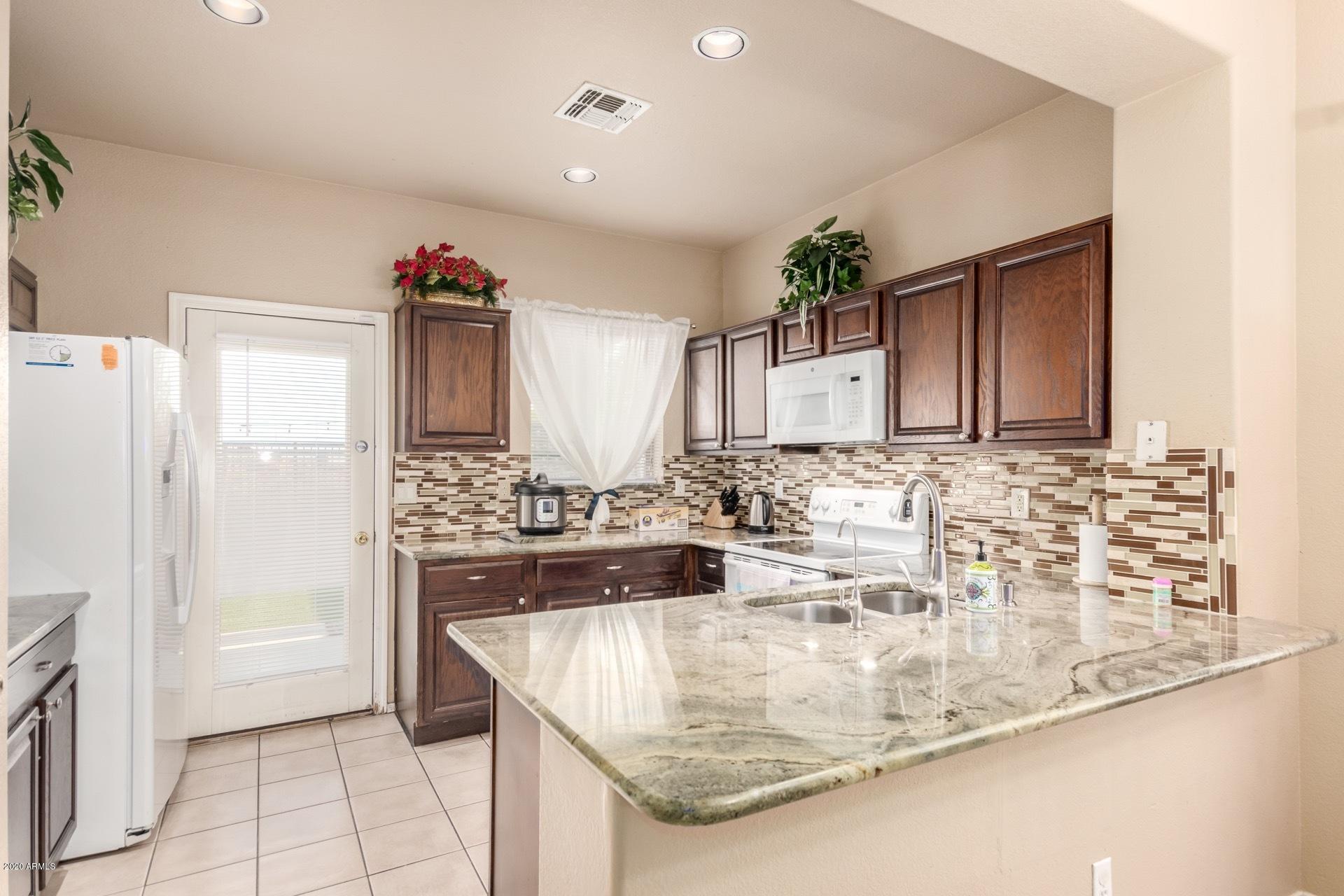9151 West Berkeley Road Phoenix, AZ 85037 - Photo 10 of 25 Kitchen
