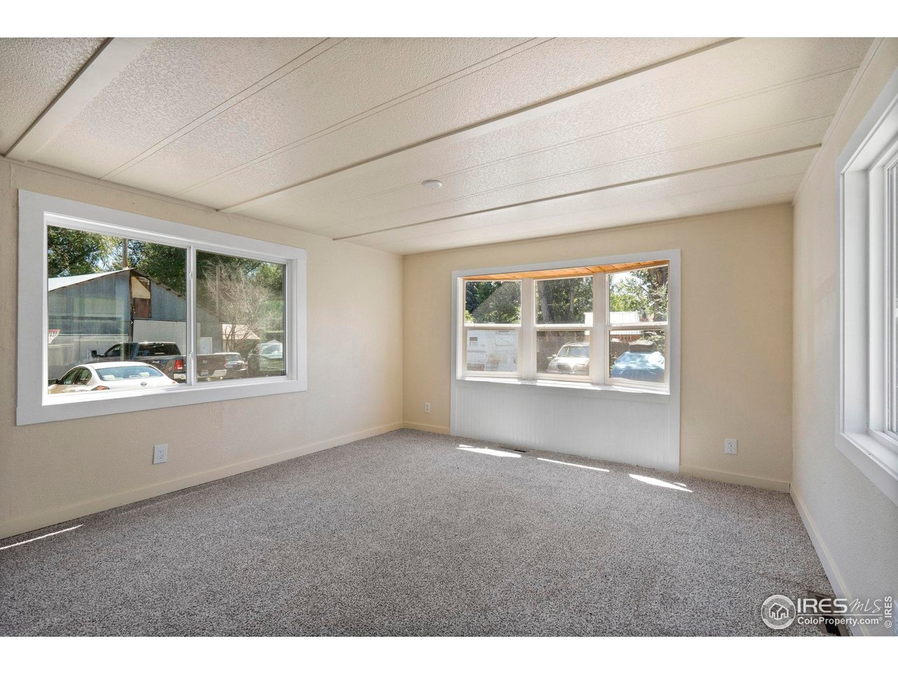 400 South Overland Trail, Unit 6 Fort Collins, CO 80521 - Photo 13 of 21 a view of an empty room with a window