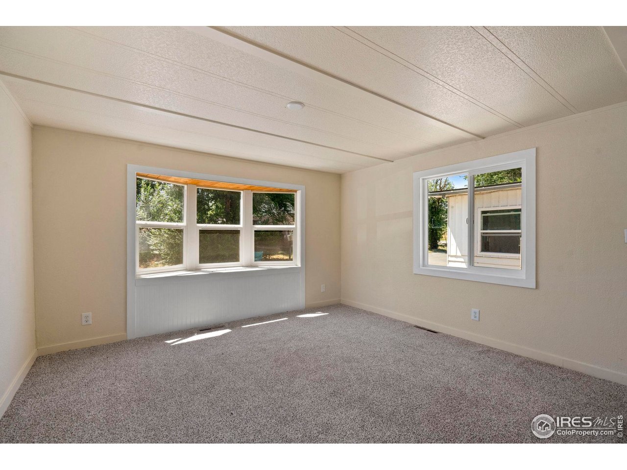 400 South Overland Trail, Unit 6 Fort Collins, CO 80521 - Photo 15 of 21 a view of an empty room with a window