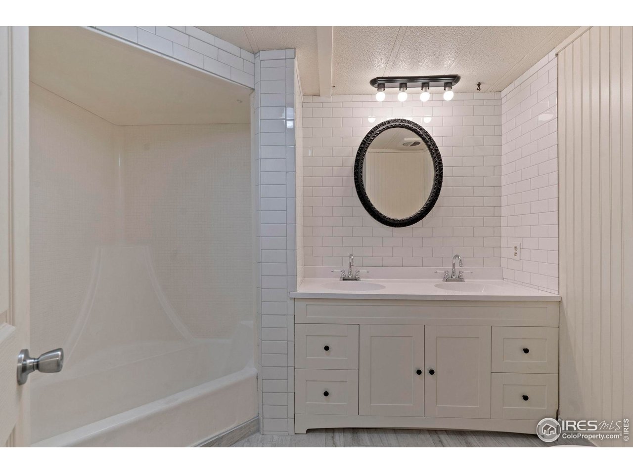 400 South Overland Trail, Unit 6 Fort Collins, CO 80521 - Photo 17 of 21 a bathroom with a sink and a mirror