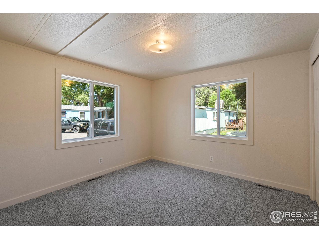 400 South Overland Trail, Unit 6 Fort Collins, CO 80521 - Photo 20 of 21 a view of an empty room with a window