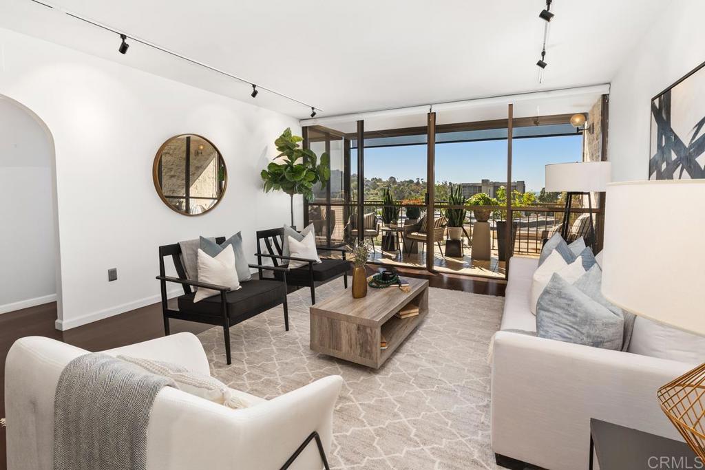 2500 Torrey Pines Road, Unit 402 La Jolla, CA 92037 - Photo 3 of 50 a living room with furniture and a window