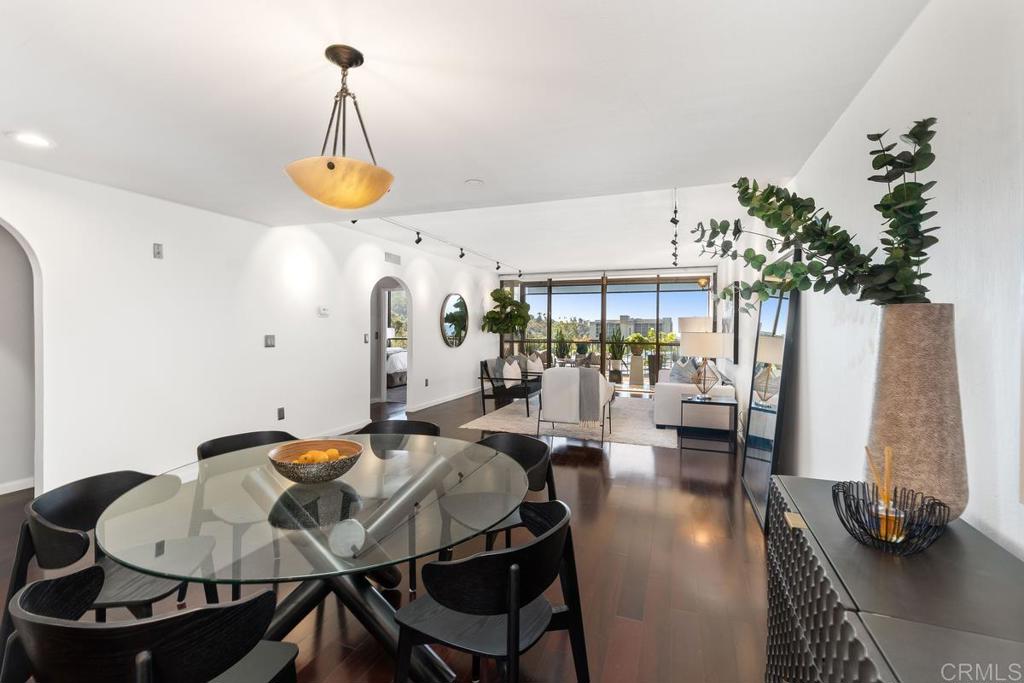 2500 Torrey Pines Road, Unit 402 La Jolla, CA 92037 - Photo 8 of 50 a view of a dining room with furniture and wooden floor