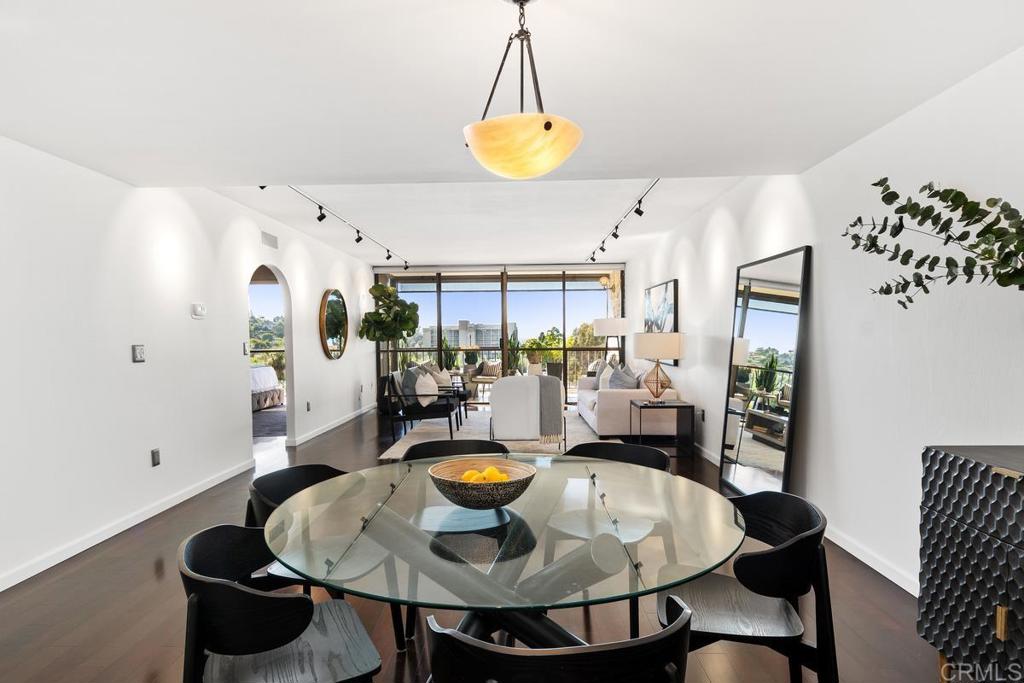 2500 Torrey Pines Road, Unit 402 La Jolla, CA 92037 - Photo 10 of 50 a view of a dining room with furniture and chandelier