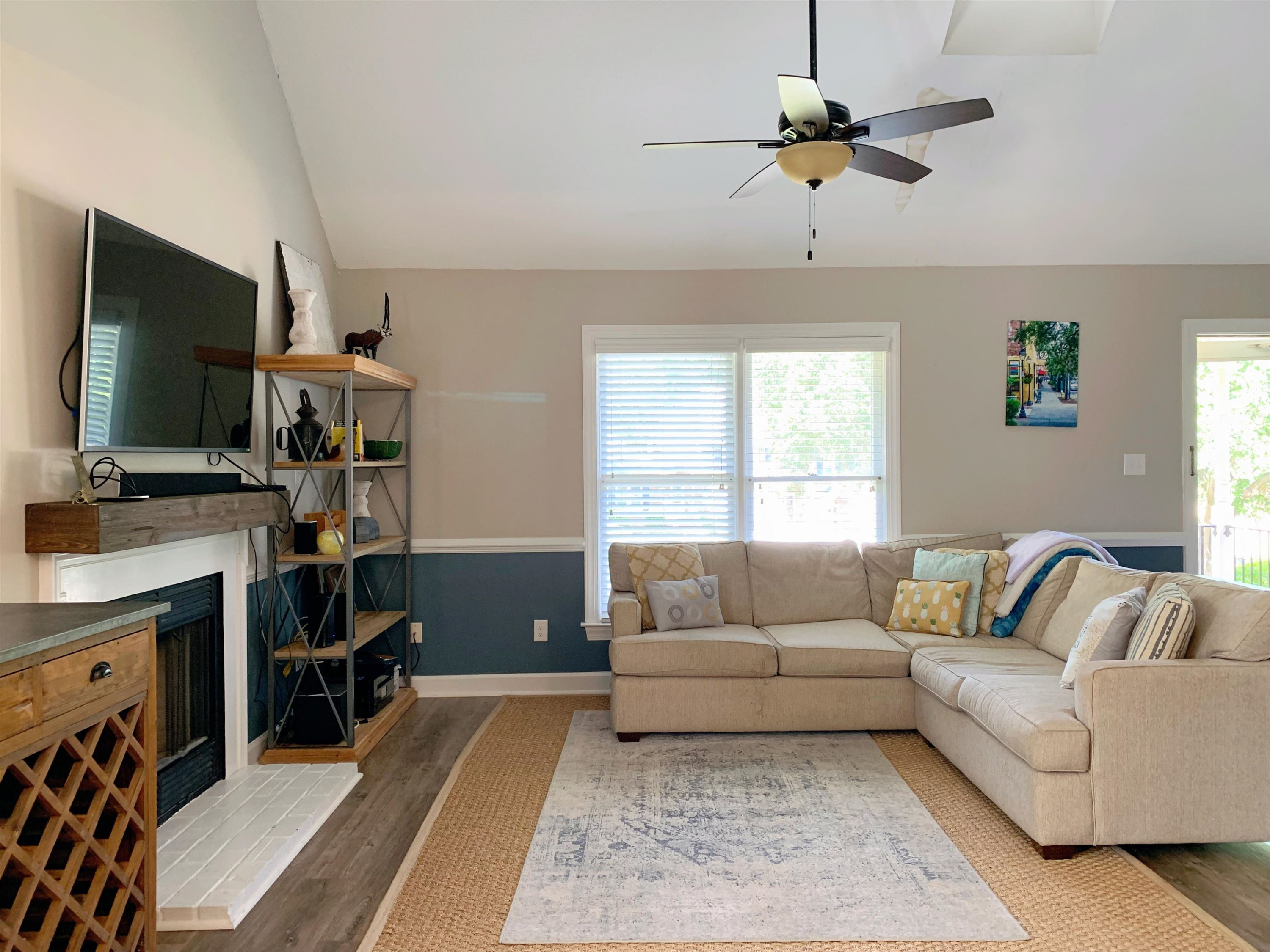 4100 Settlement Drive Durham, NC 27713 - Photo 3 of 5 a living room with furniture and a flat screen tv