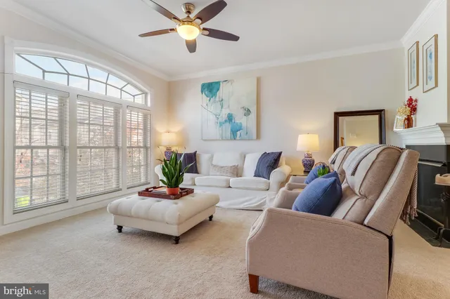 a living room with furniture and a view of living room