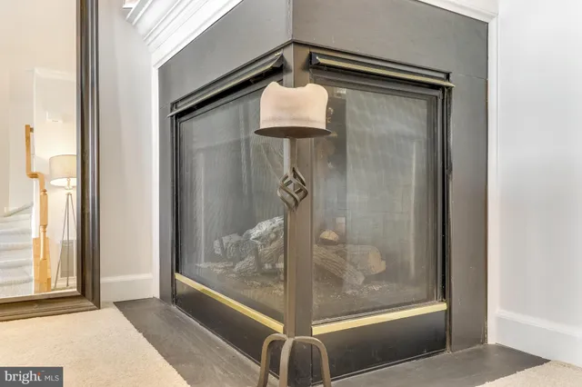 a view of a chairs and table in the balcony