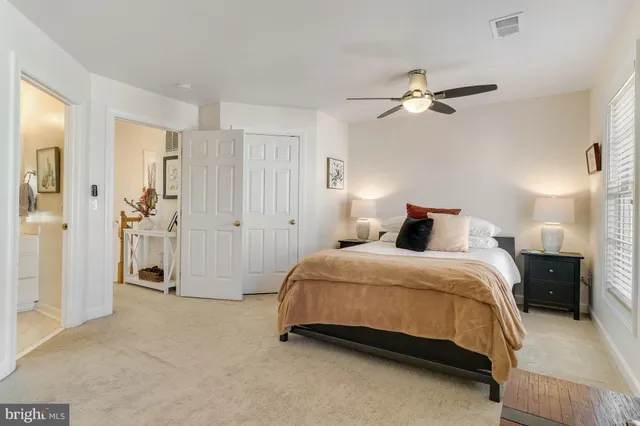 a bedroom with a bed and furniture