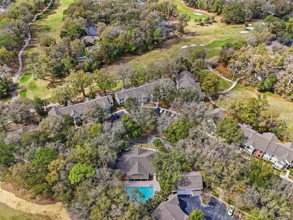 an aerial view of residential house with outdoor space