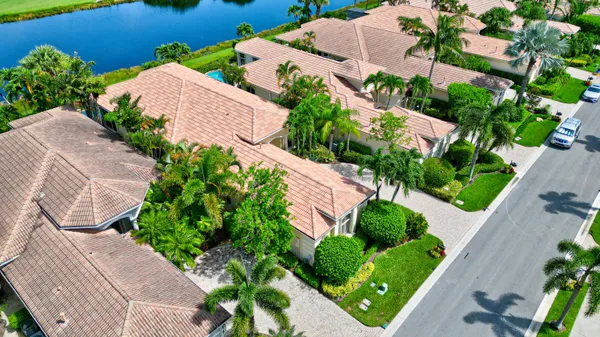 an aerial view of a house with a garden and plants