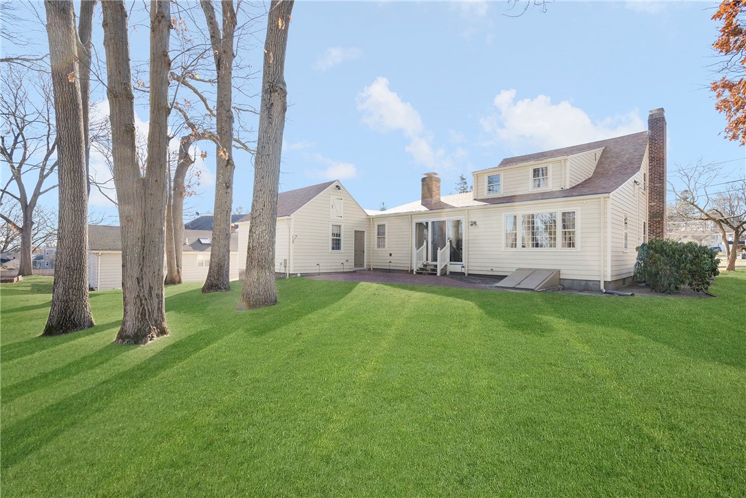 106 Sagamore Road Cranston, RI 02920 - Photo 31 of 43 Backyard looking at rear of home
