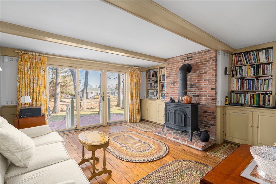 106 Sagamore Road Cranston, RI 02920 - Photo 4 of 43 Family Room with Sliders to Back Brick Patio and Backyard