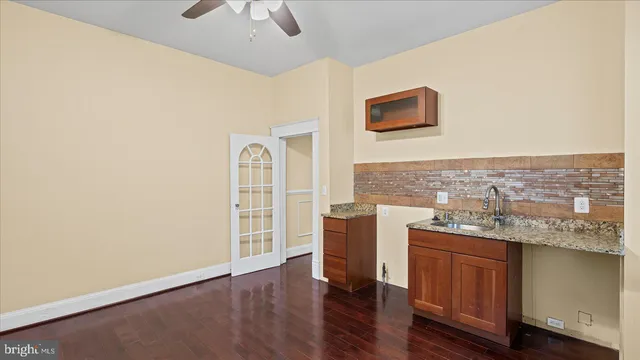 a view of workspace with wooden floor