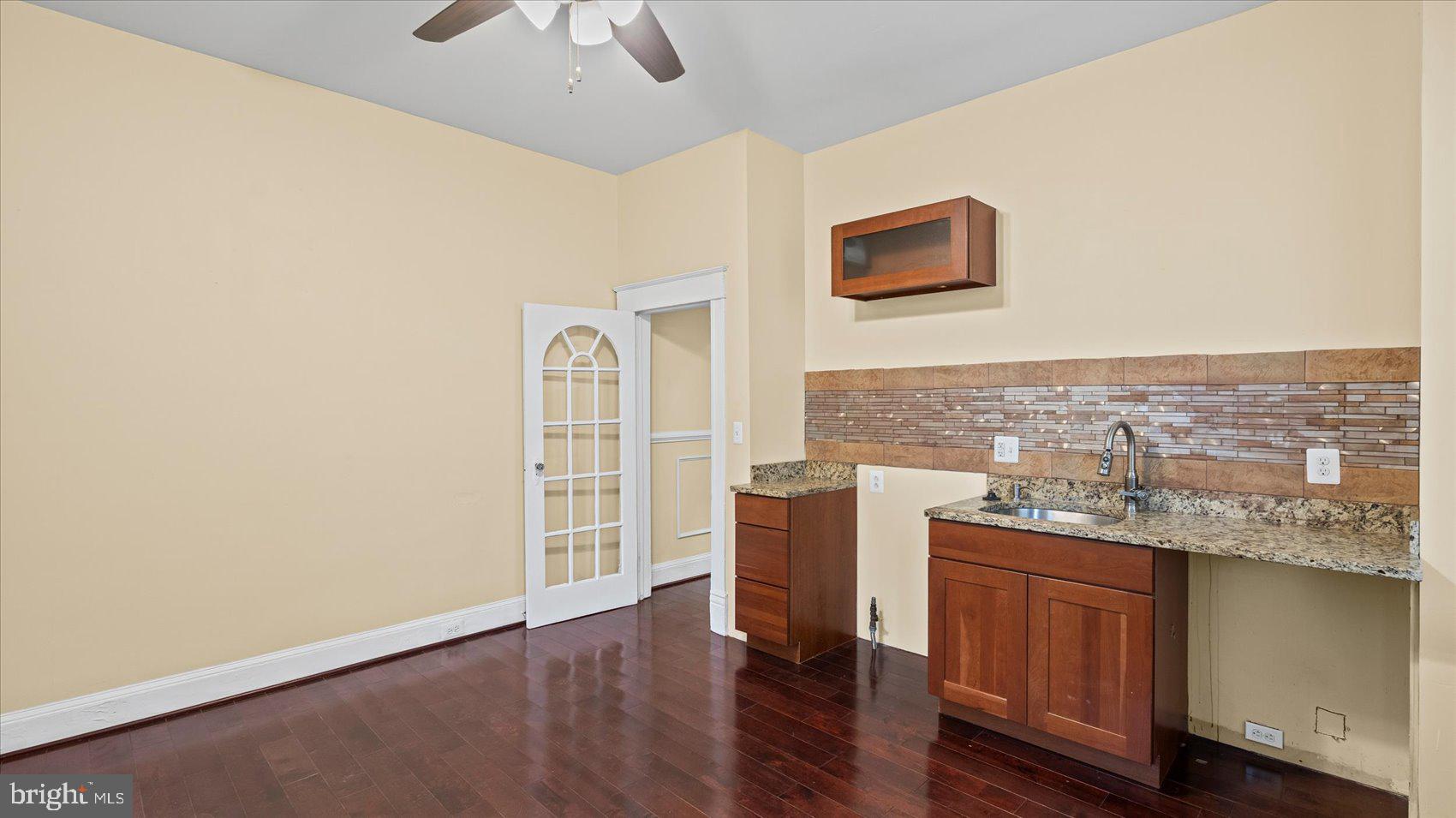 2413 Madison Avenue Baltimore, MD 21217 - Photo 12 of 48 a view of workspace with wooden floor