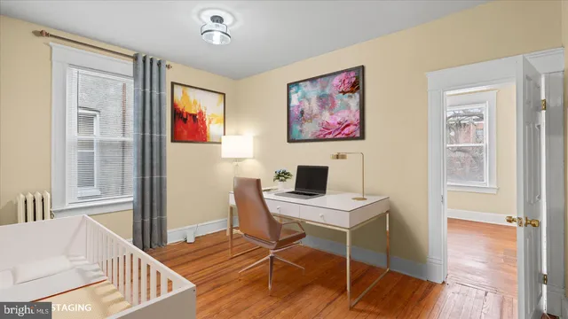 a view of a livingroom with furniture and window