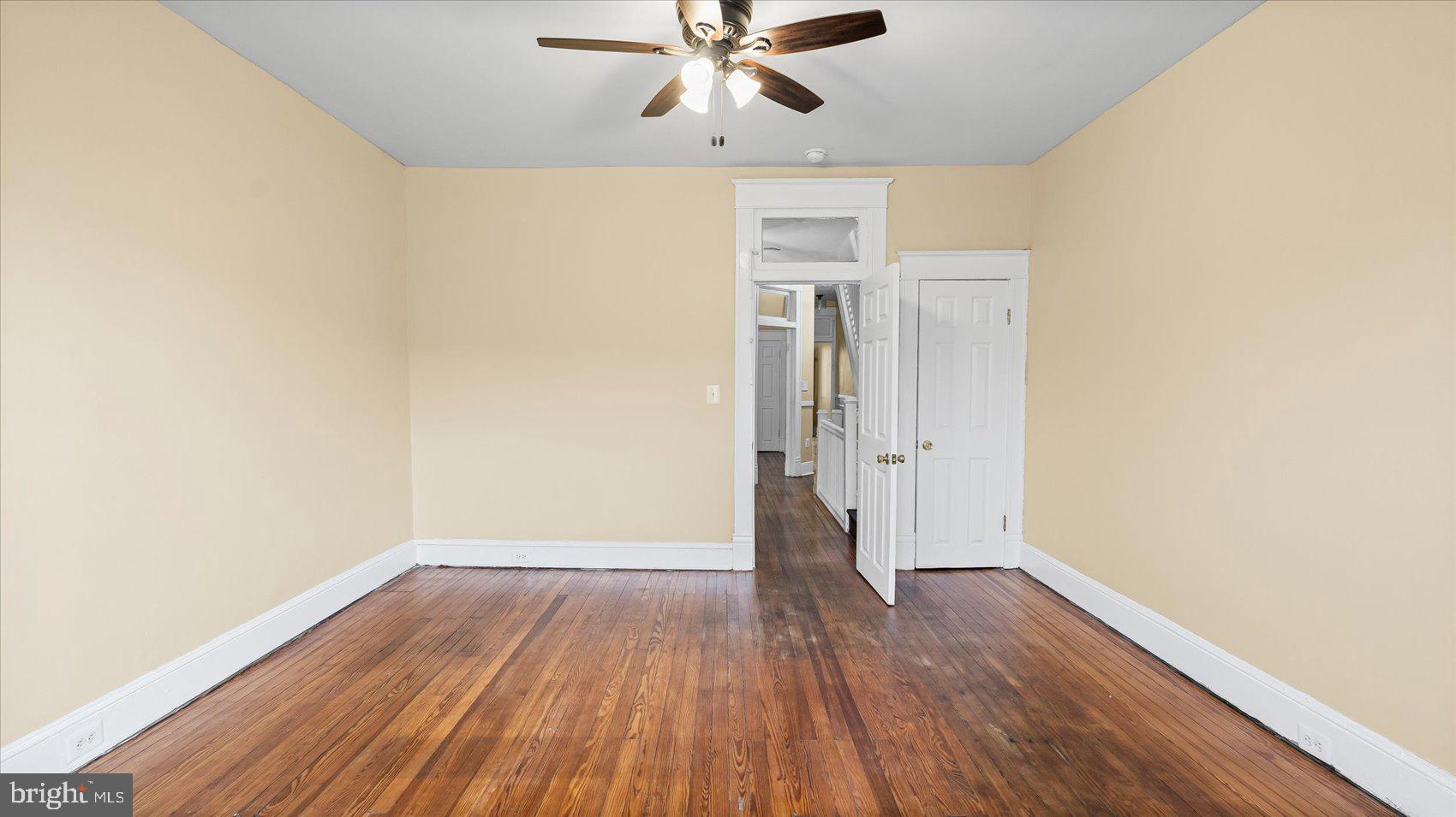 2413 Madison Avenue Baltimore, MD 21217 - Photo 23 of 48 wooden floor in an empty room