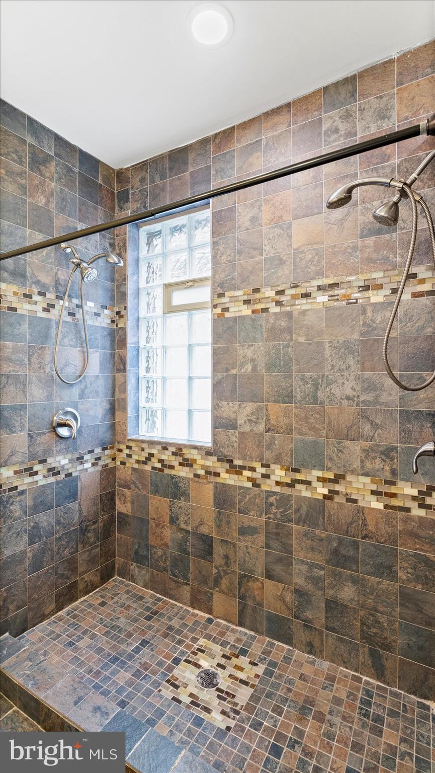 2413 Madison Avenue Baltimore, MD 21217 - Photo 27 of 48 a bathroom with a shower