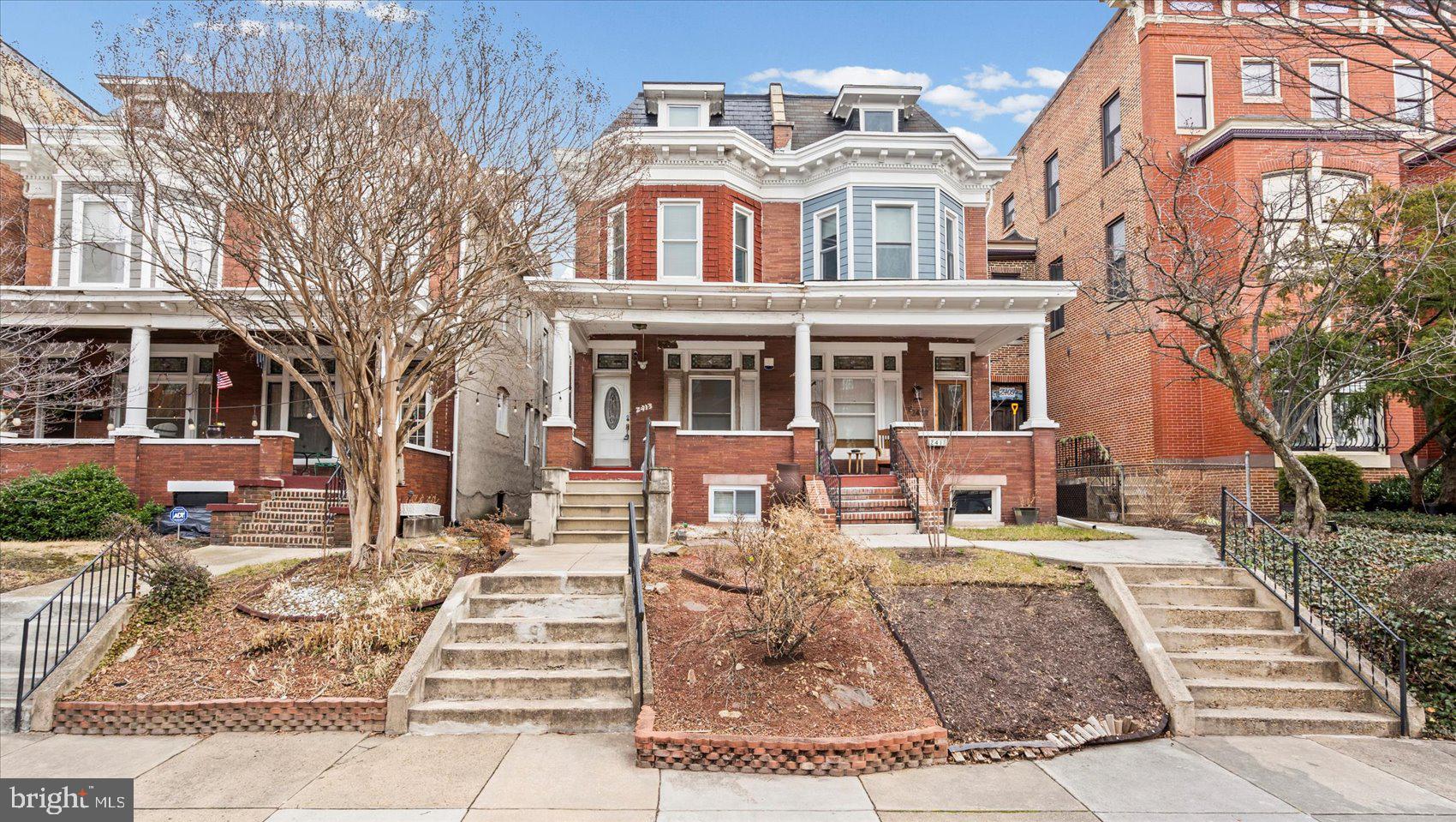 2413 Madison Avenue Baltimore, MD 21217 - Photo 37 of 48 a view of a building with many windows