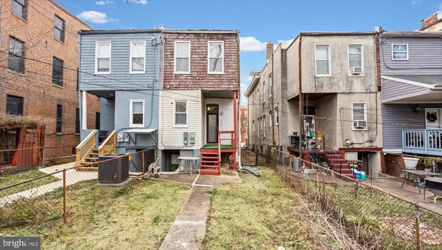 a view of a chairs and tables in the patio