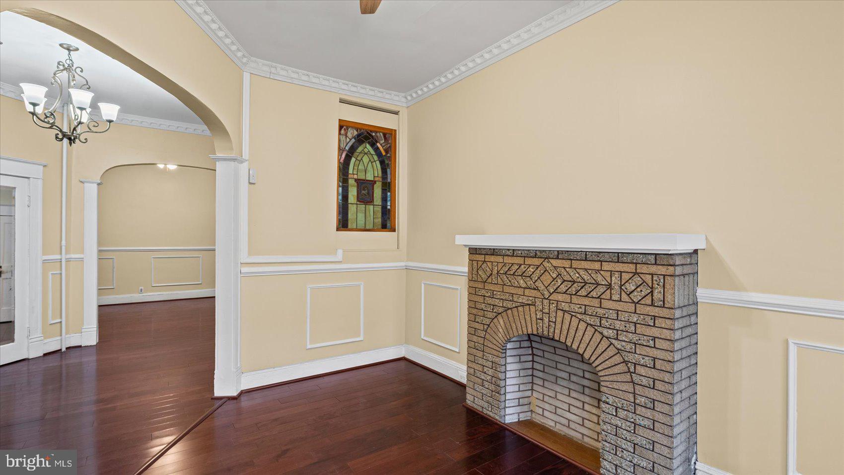 2413 Madison Avenue Baltimore, MD 21217 - Photo 5 of 48 a view of entryway with wooden floor