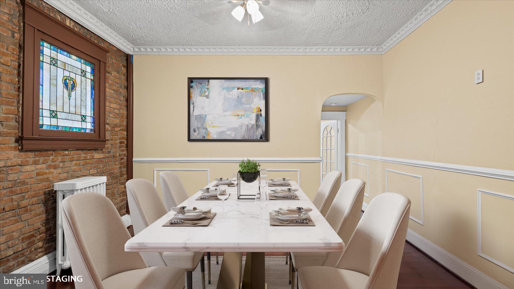 2413 Madison Avenue Baltimore, MD 21217 - Photo 7 of 48 a view of a dining room with furniture window and wooden floor