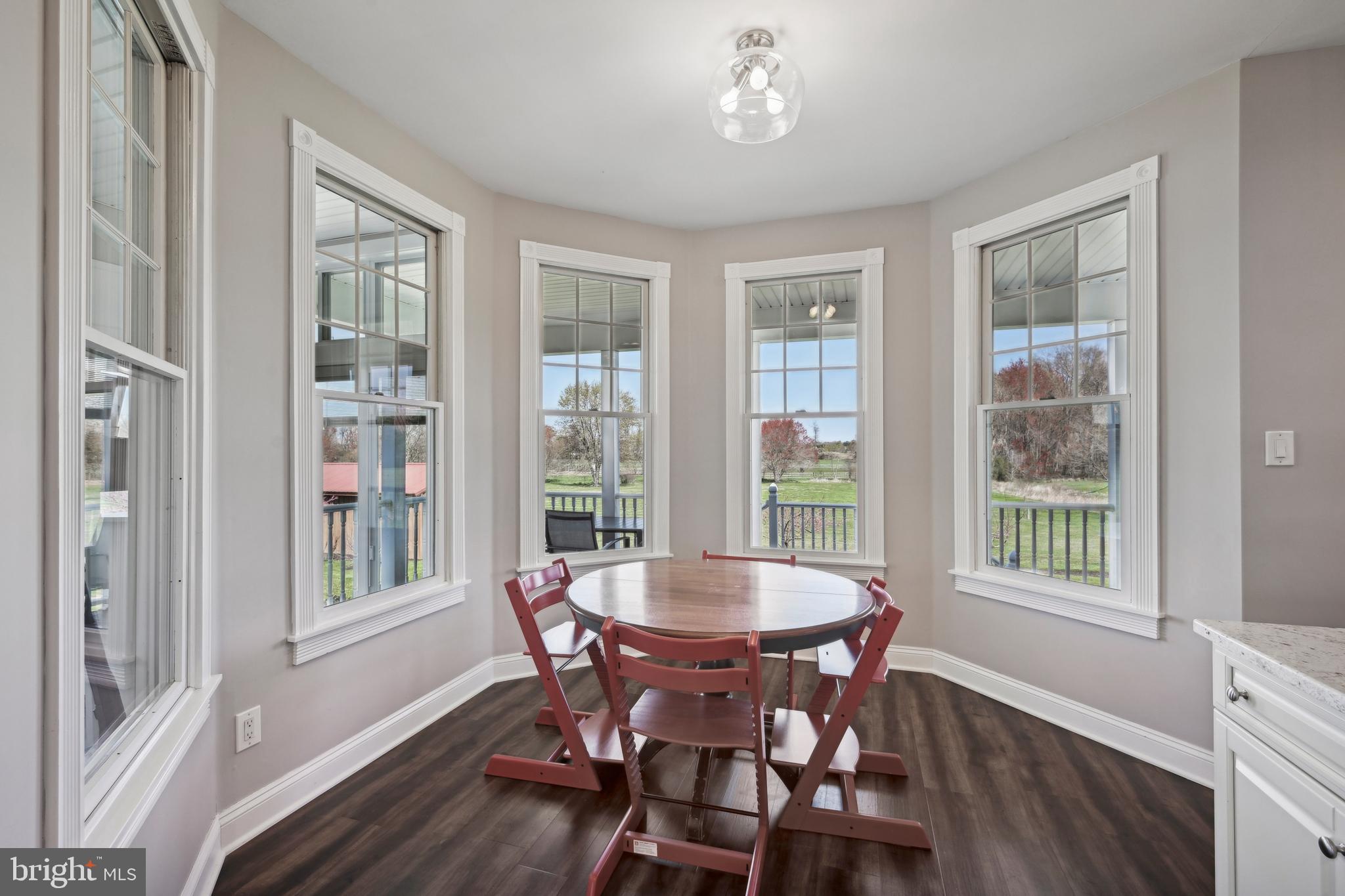 358 Eayrestown Road Southampton, NJ 08088 - Photo 12 of 54 a view of a dining room with furniture window and wooden floor