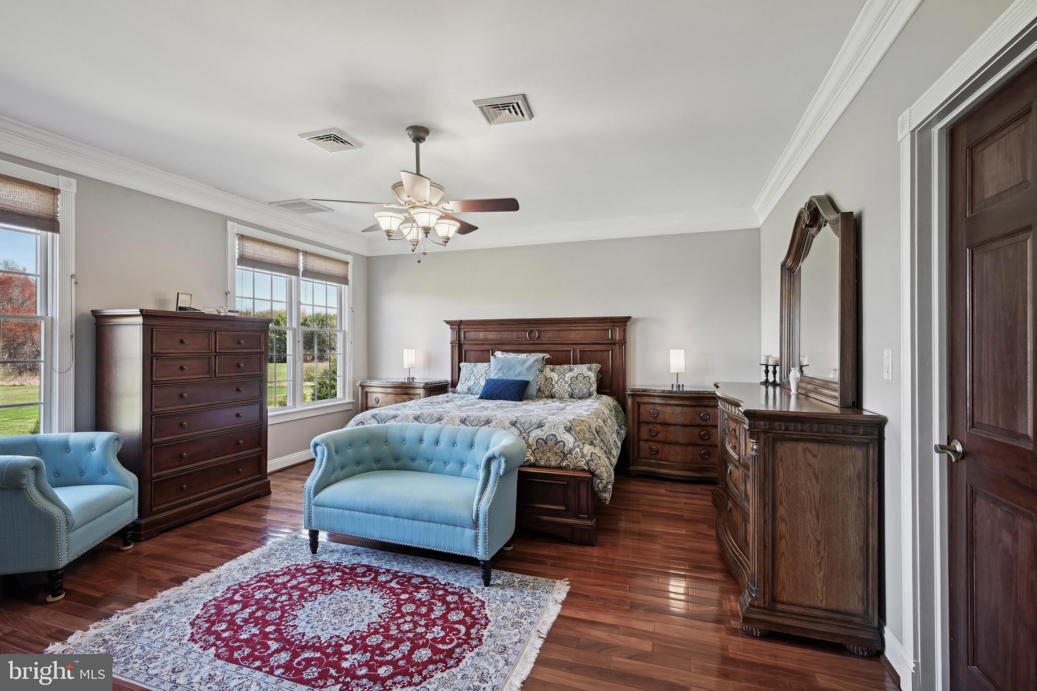 358 Eayrestown Road Southampton, NJ 08088 - Photo 15 of 54 a bedroom with a bed and wooden floor