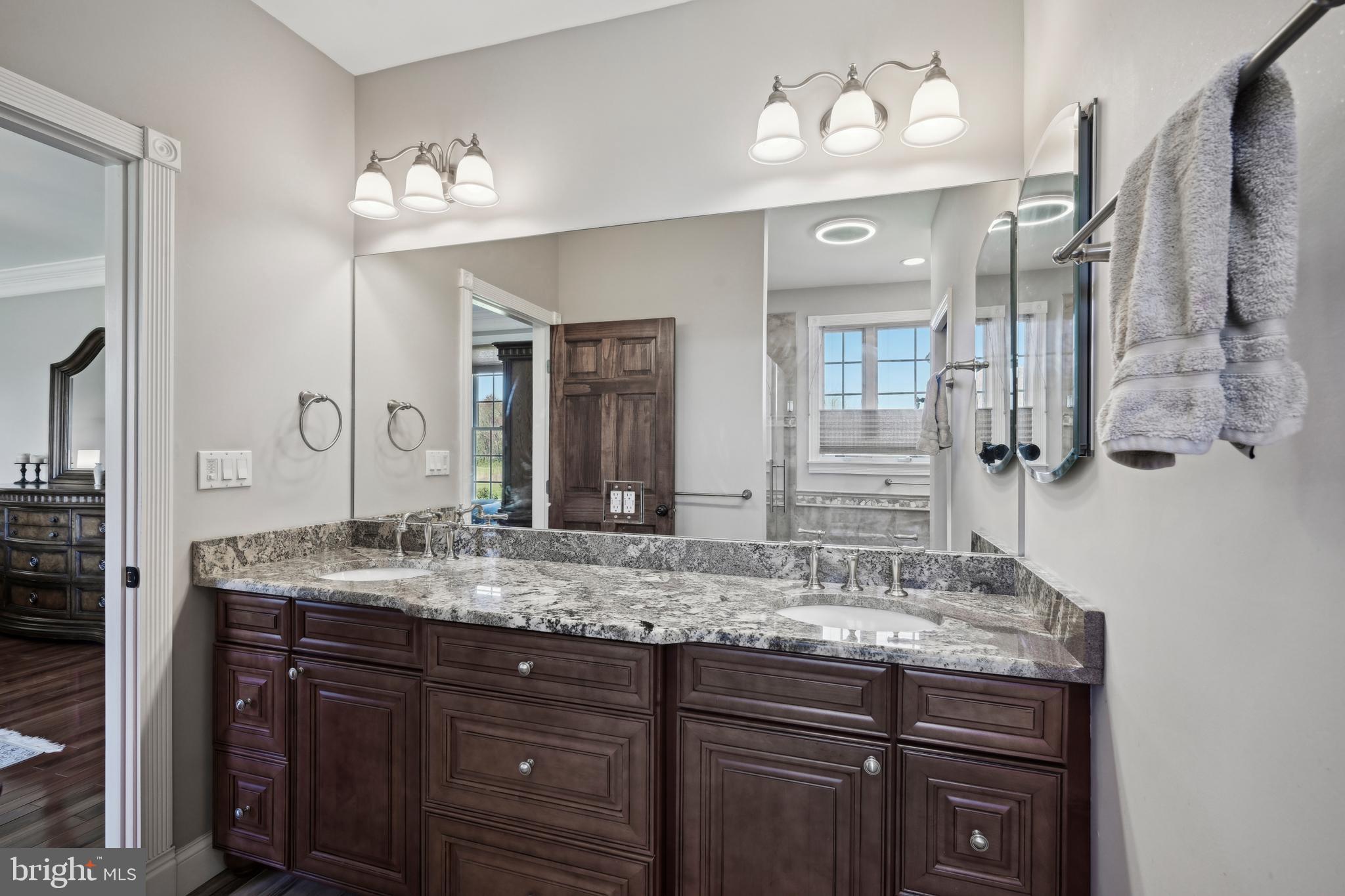 358 Eayrestown Road Southampton, NJ 08088 - Photo 17 of 54 a bathroom with a granite countertop sink and a mirror