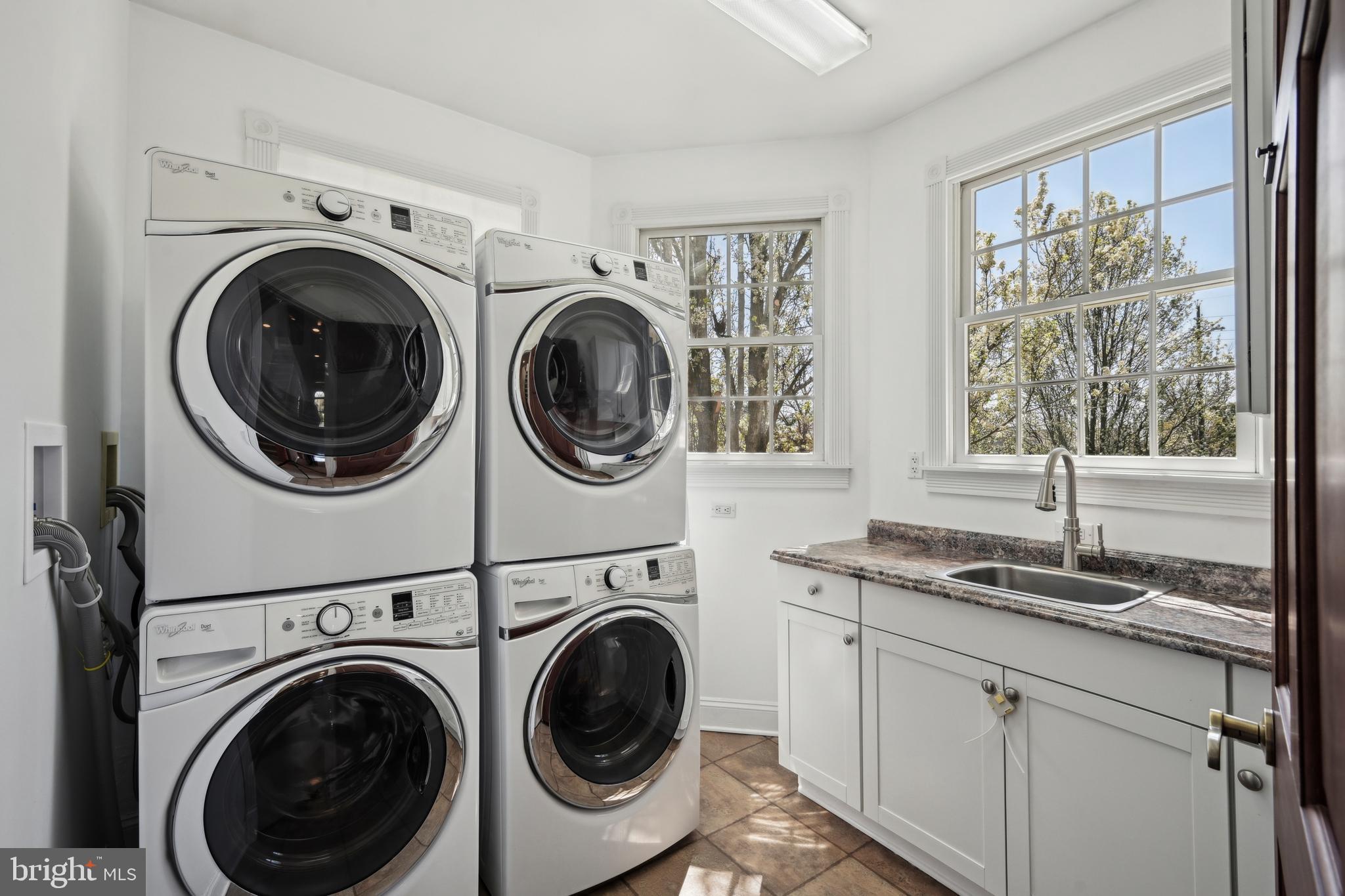 358 Eayrestown Road Southampton, NJ 08088 - Photo 21 of 54 a utility room with sink dryer and washer