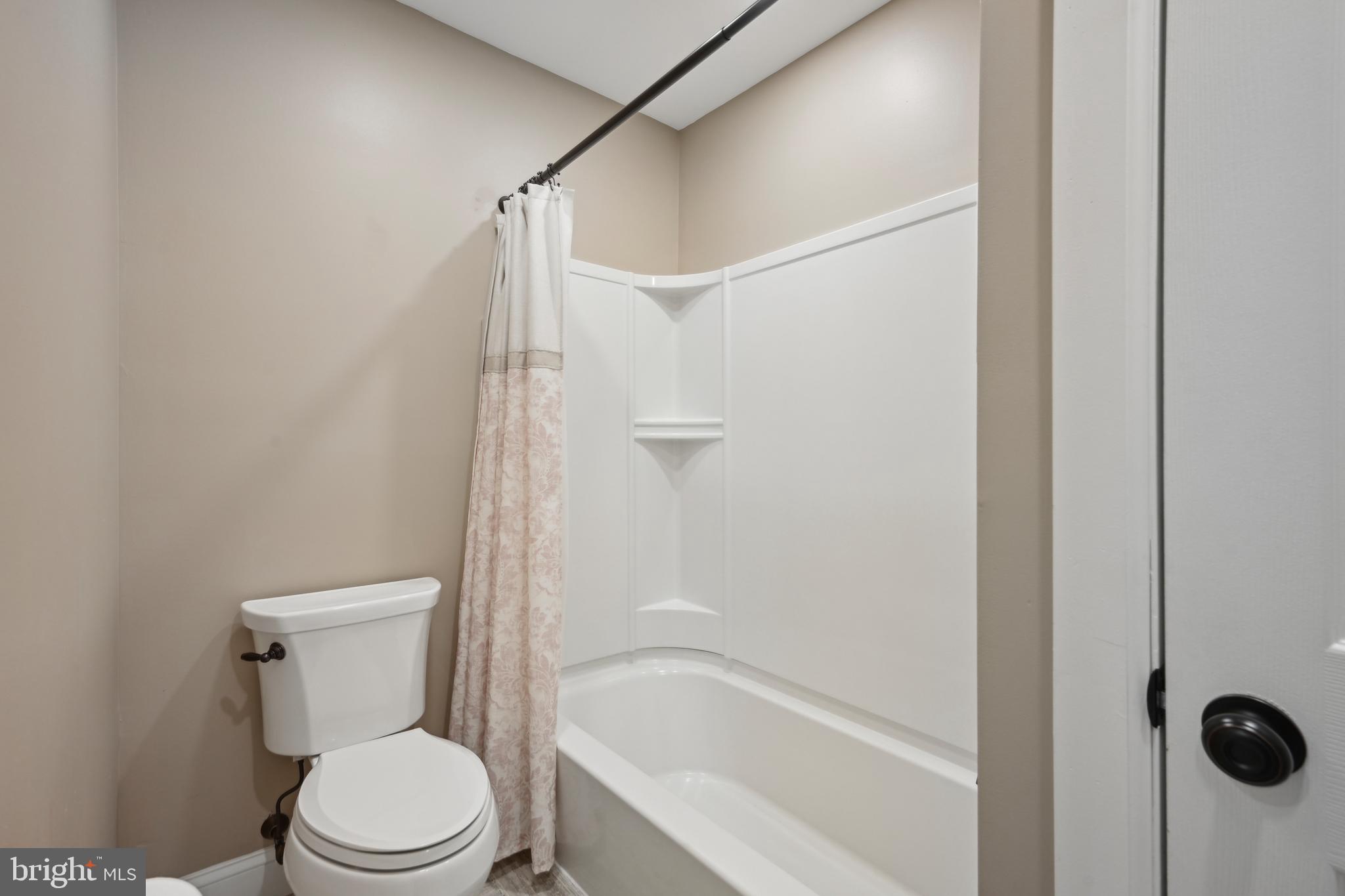 358 Eayrestown Road Southampton, NJ 08088 - Photo 27 of 54 a white toilet sitting next to a bath tub